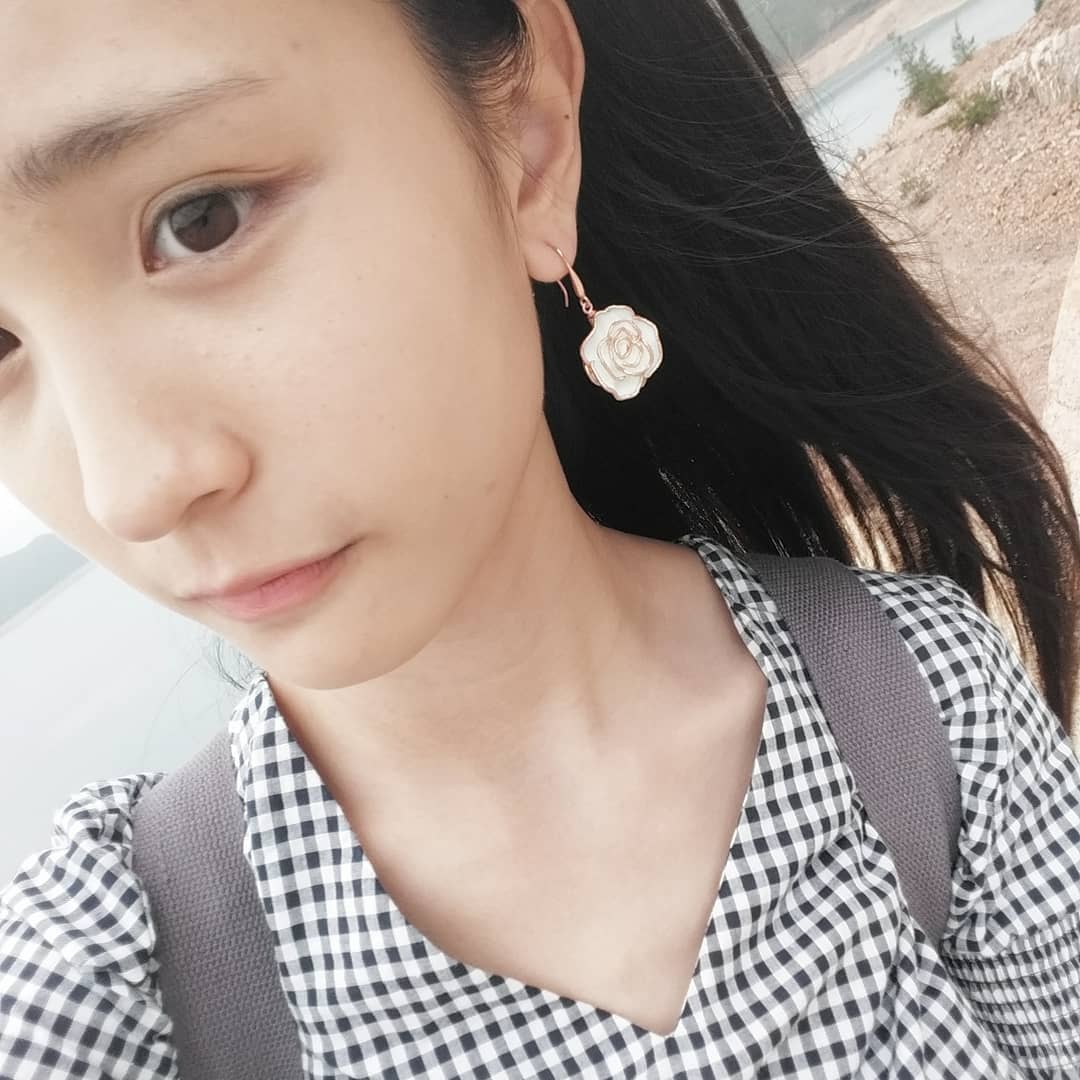  .
玫瑰花形嘅耳環